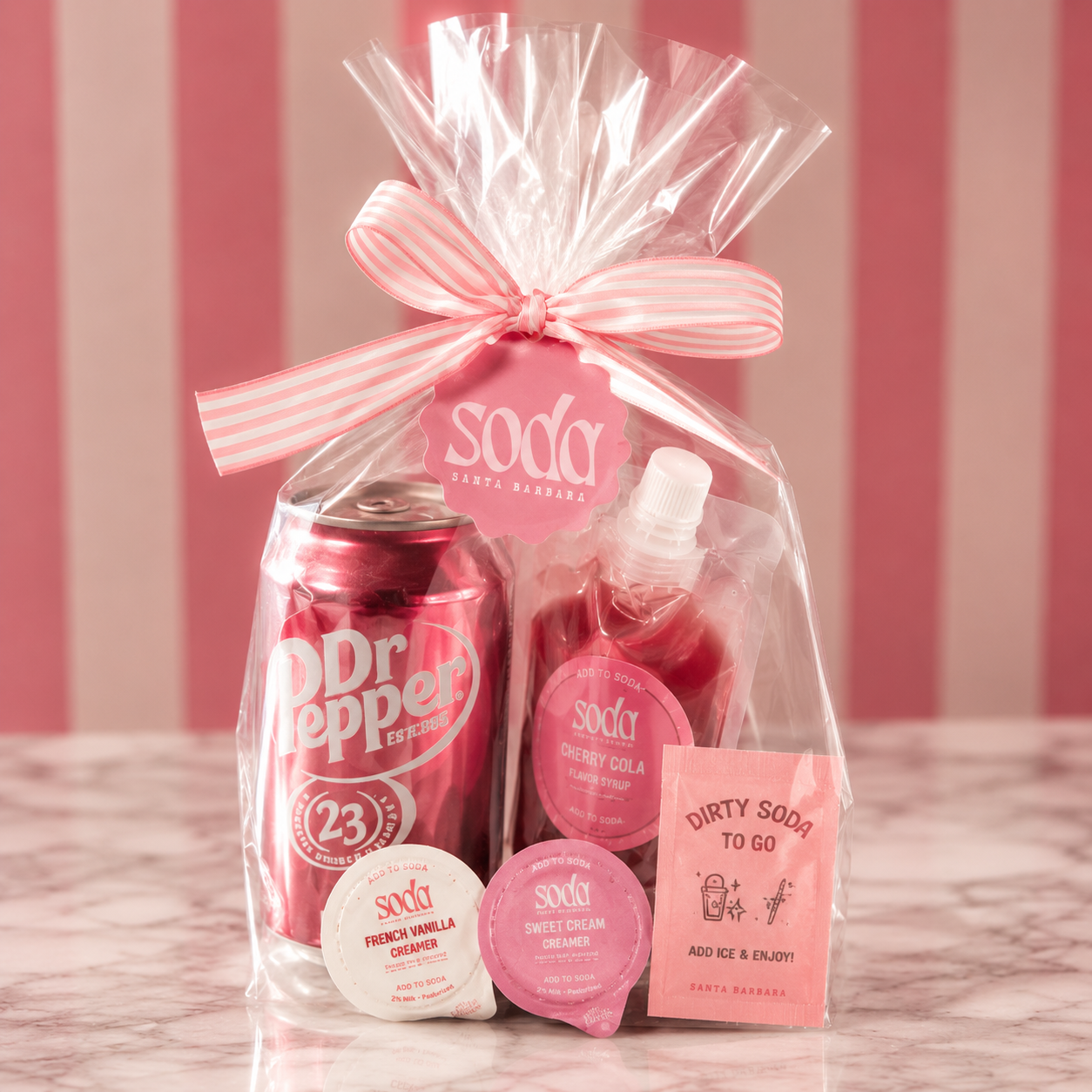 DIY Dirty Soda to-go pack with Dr Pepper, cherry cola syrup, creamers and instruction card